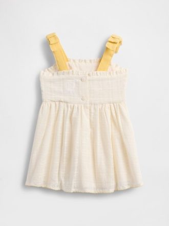 Babybroderad klänning med knyt- och axlar Babybroderad klänning med knyt- och axlar
